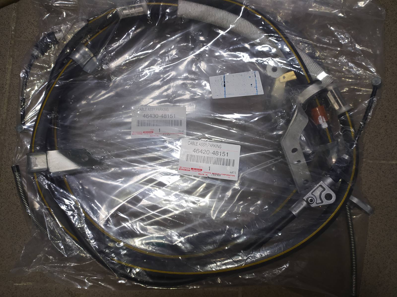 Трос стояночного тормоза левый 464300E050 TOYOTA